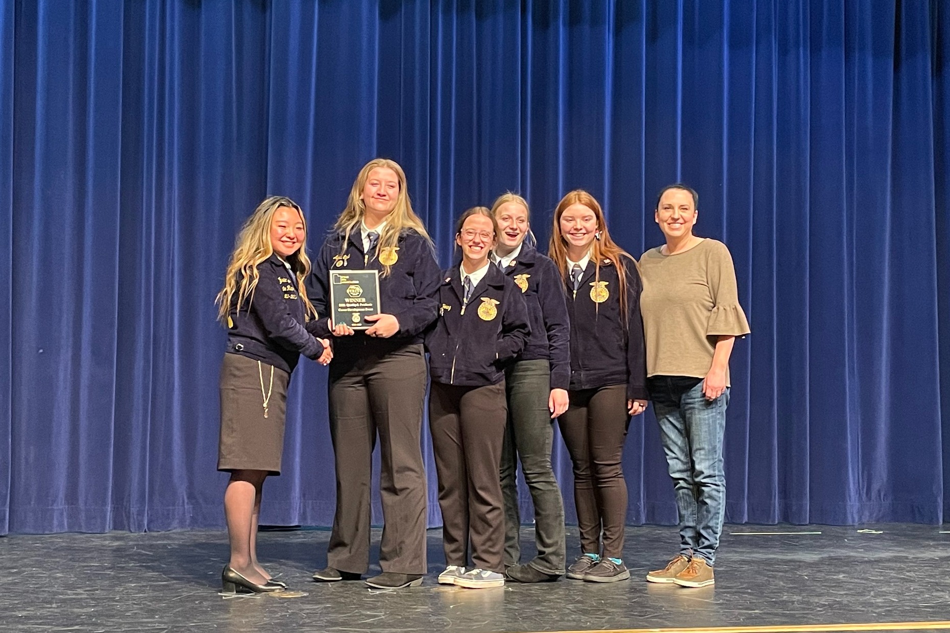 Group of 6 students at an award event