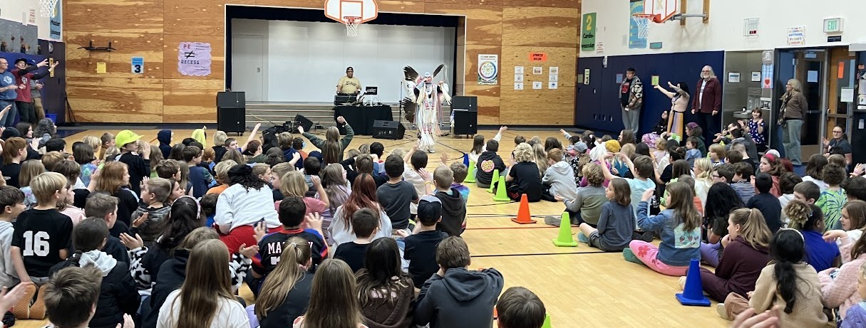 dr playing for students at salish coast