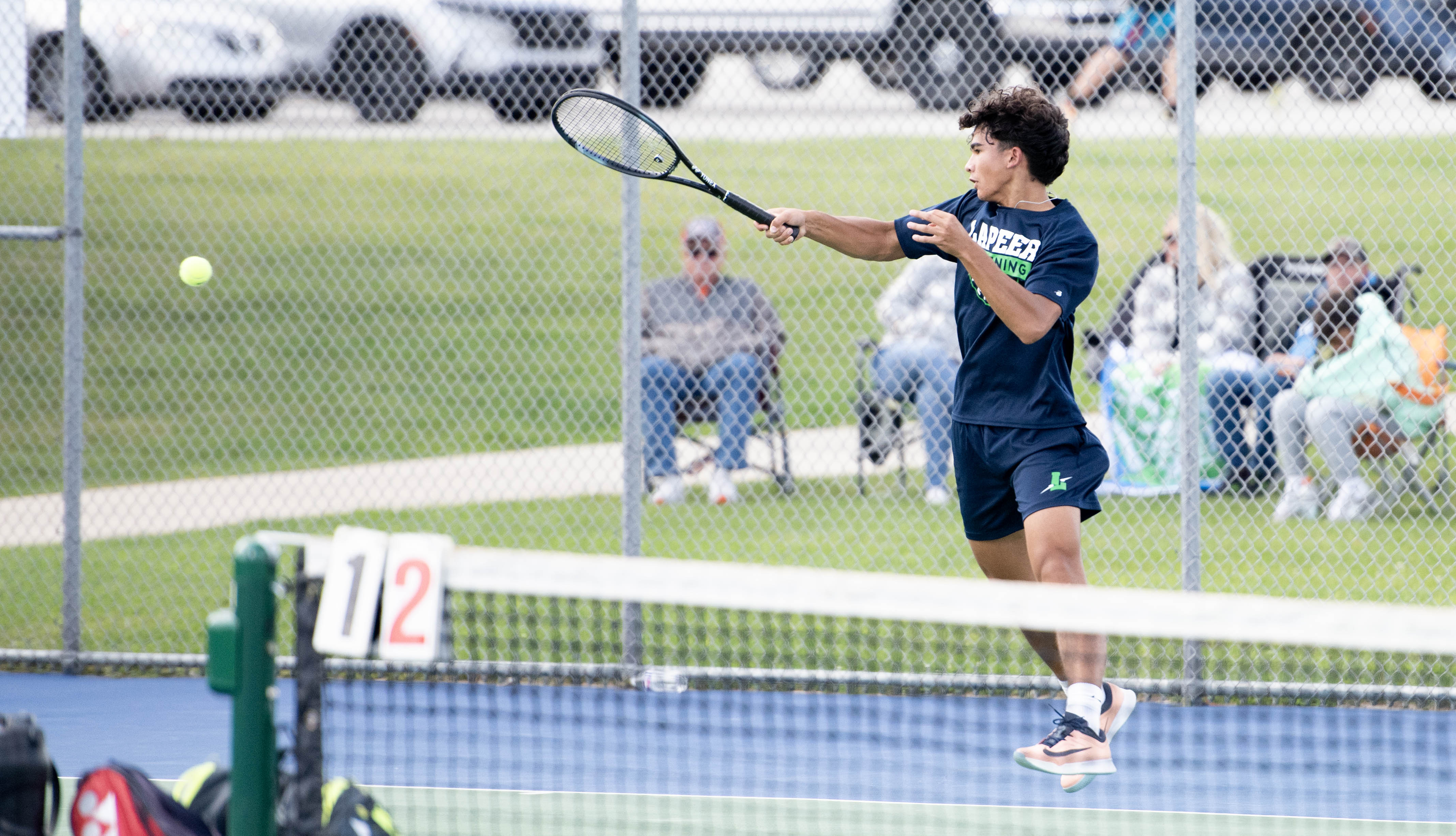 Lapeer boys tennis match vs. Midland Dow