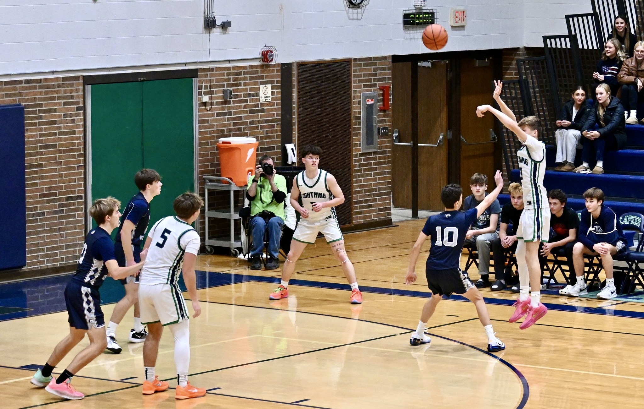 Lapeer boys varsity basketball team in action