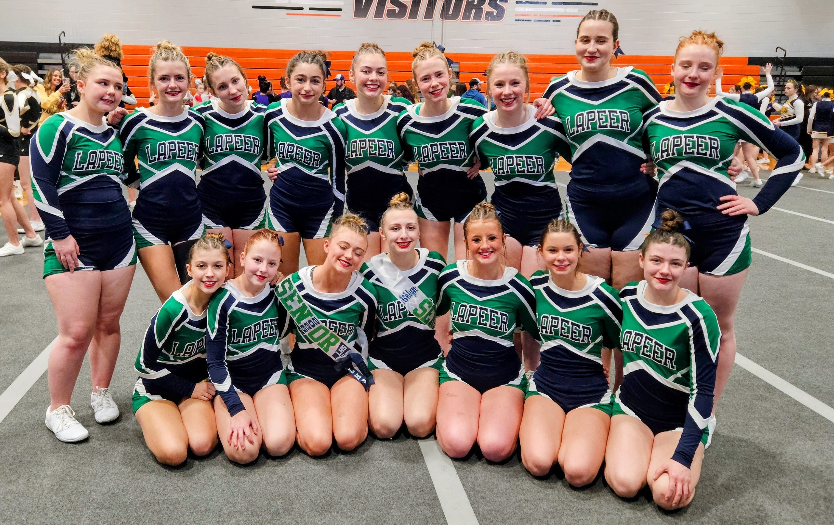 Lapeer varsity cheer at the Clio Invitational on January 17, 2026