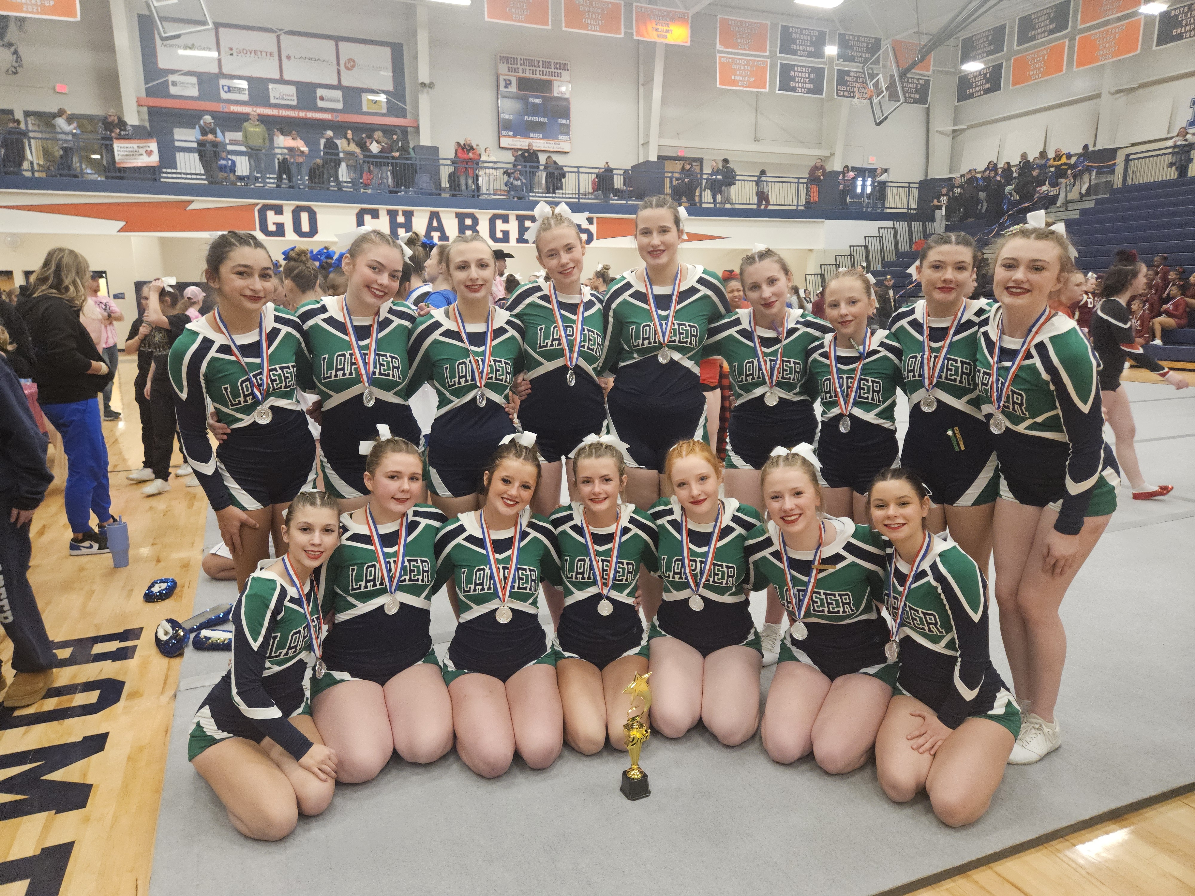 Lapeer cheerleaders at the Powers competition