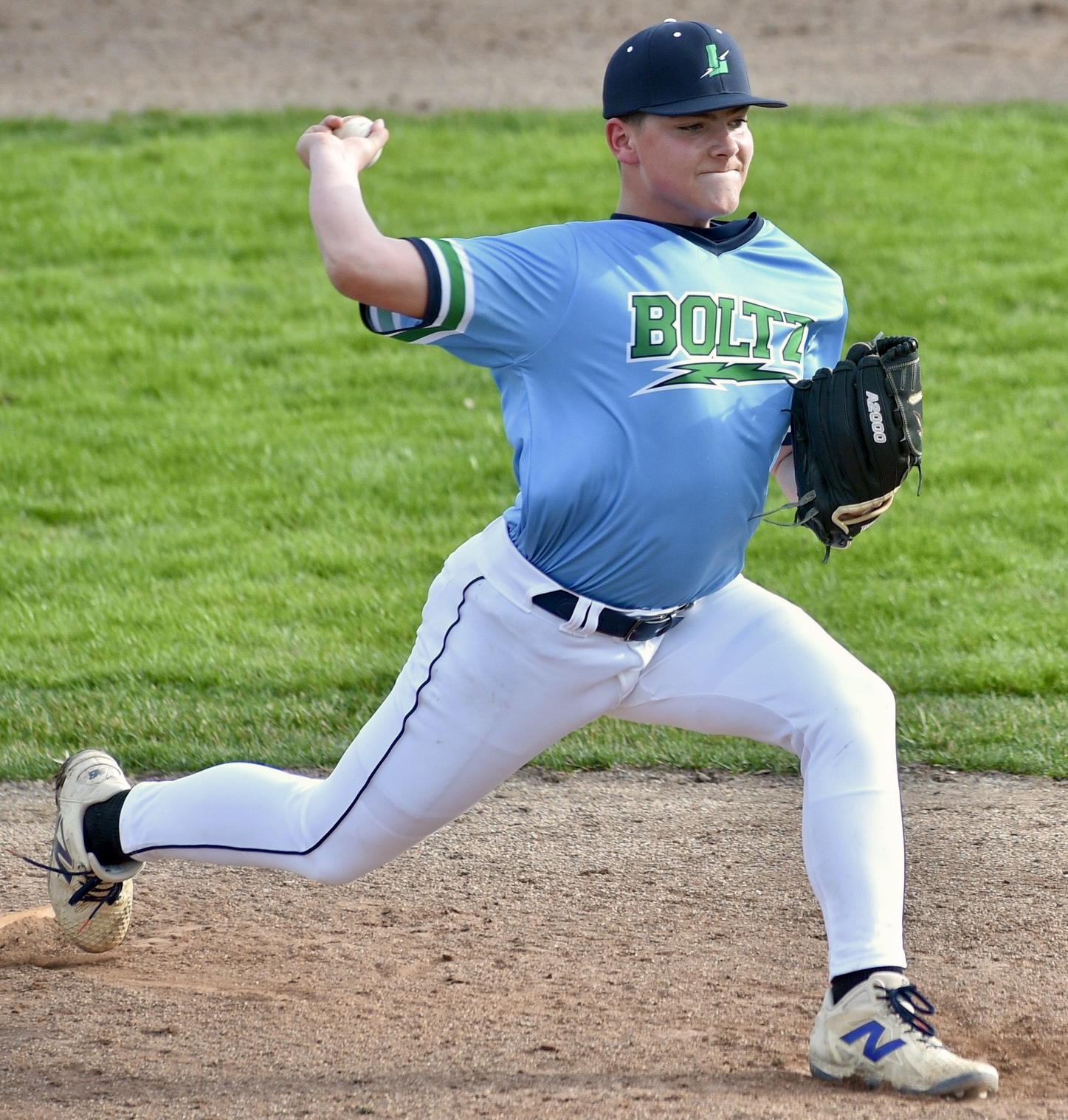 Lapeer baseball pitcher throwing a pitch in a recent game