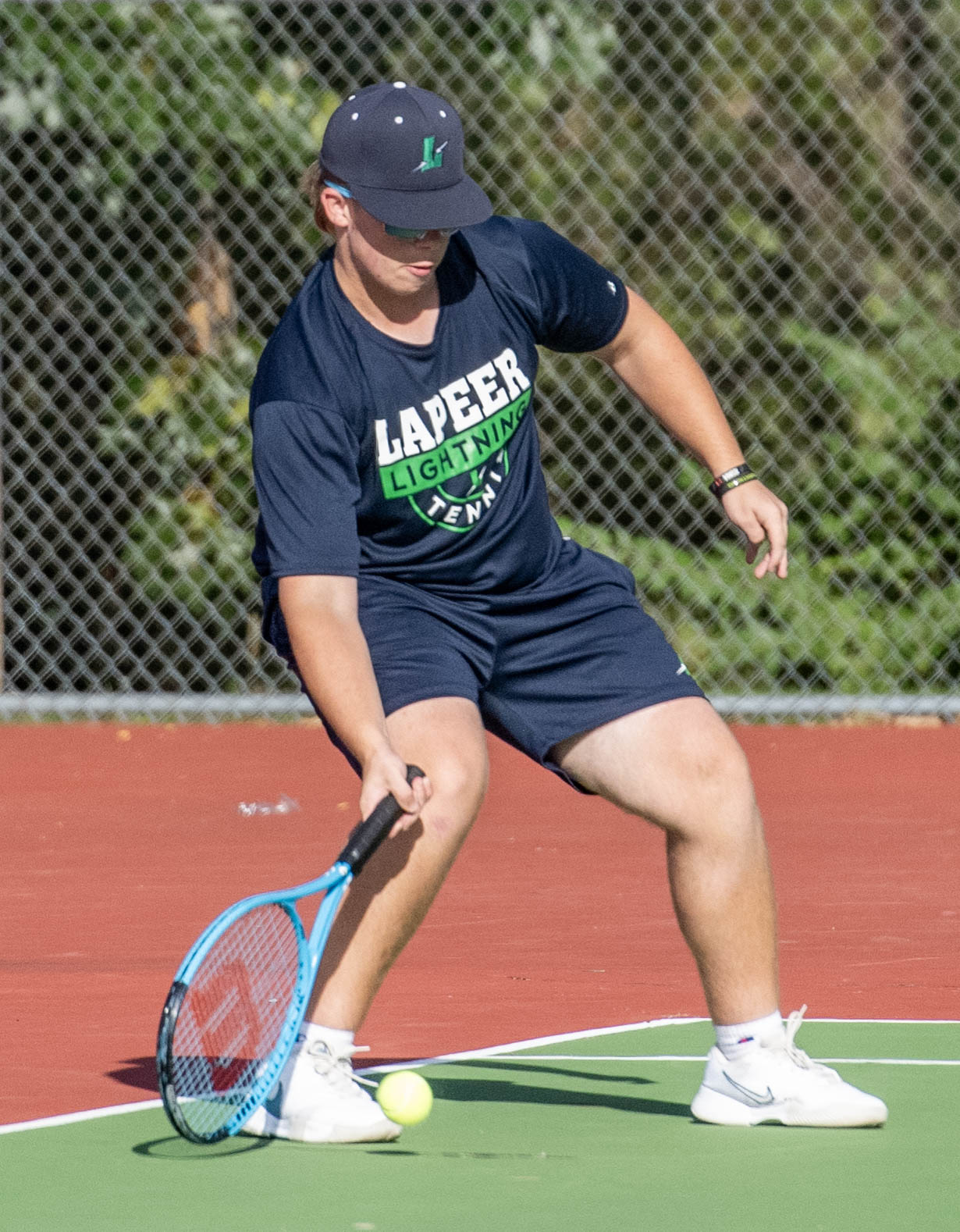 Lapeer boys tennis playing at Lake Orion