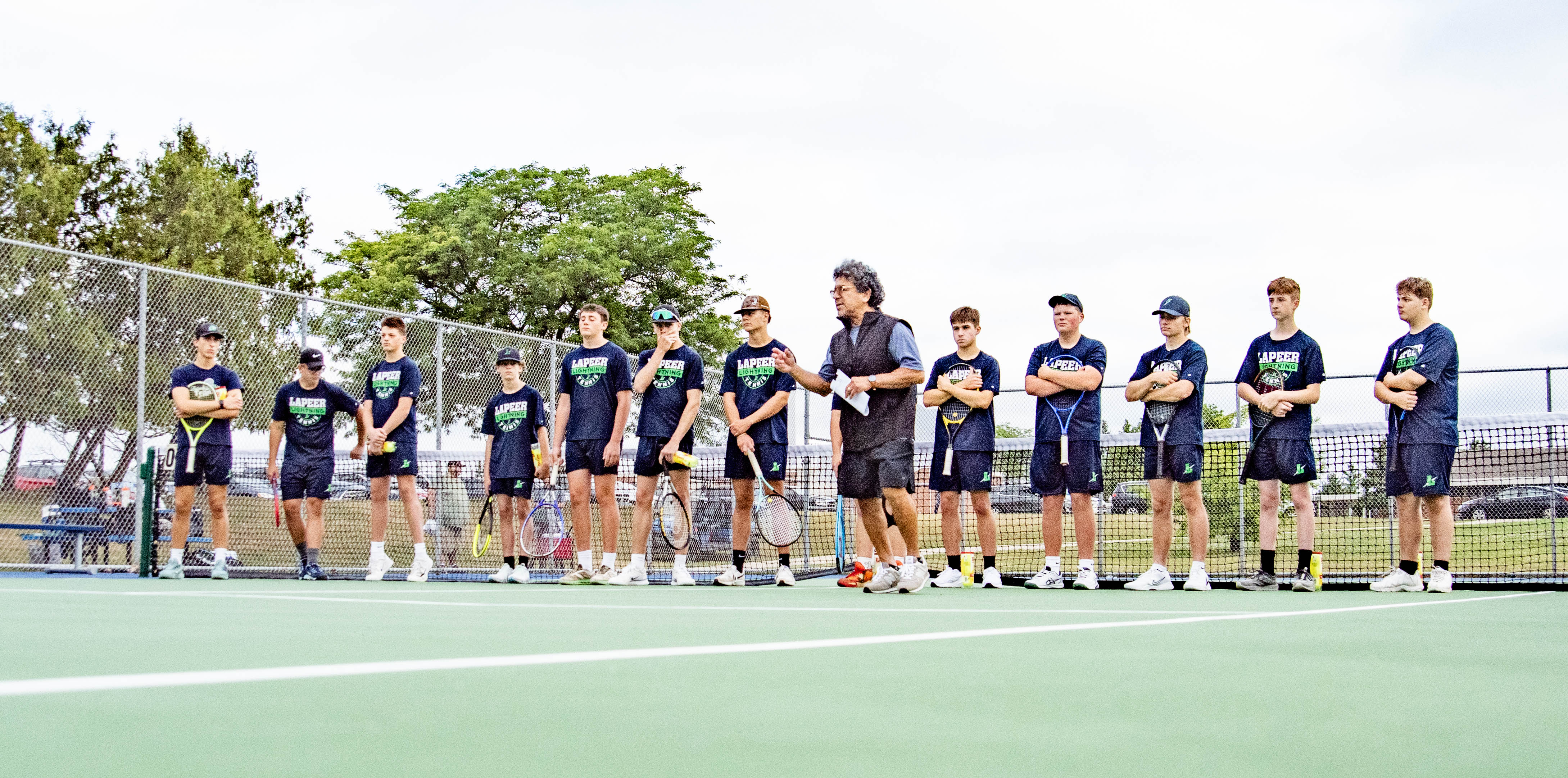 Lapeer boys tennis players hosting the first match of the year on August 17, 2026