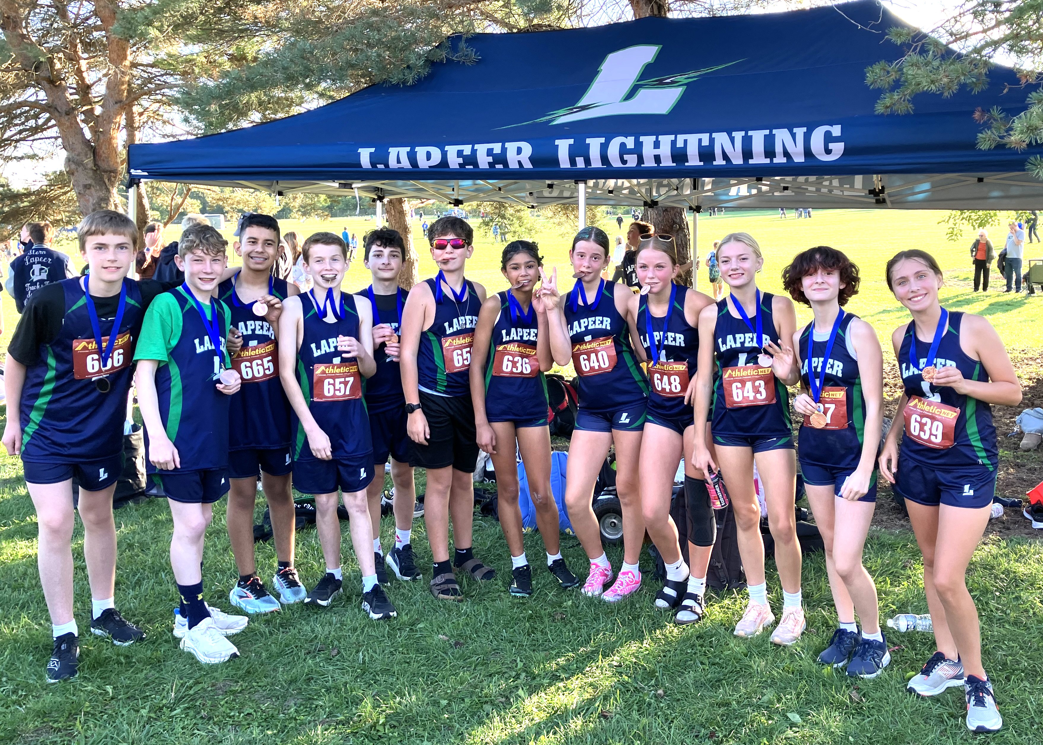 Lapeer middle school cross country teams at a meet in North Branch