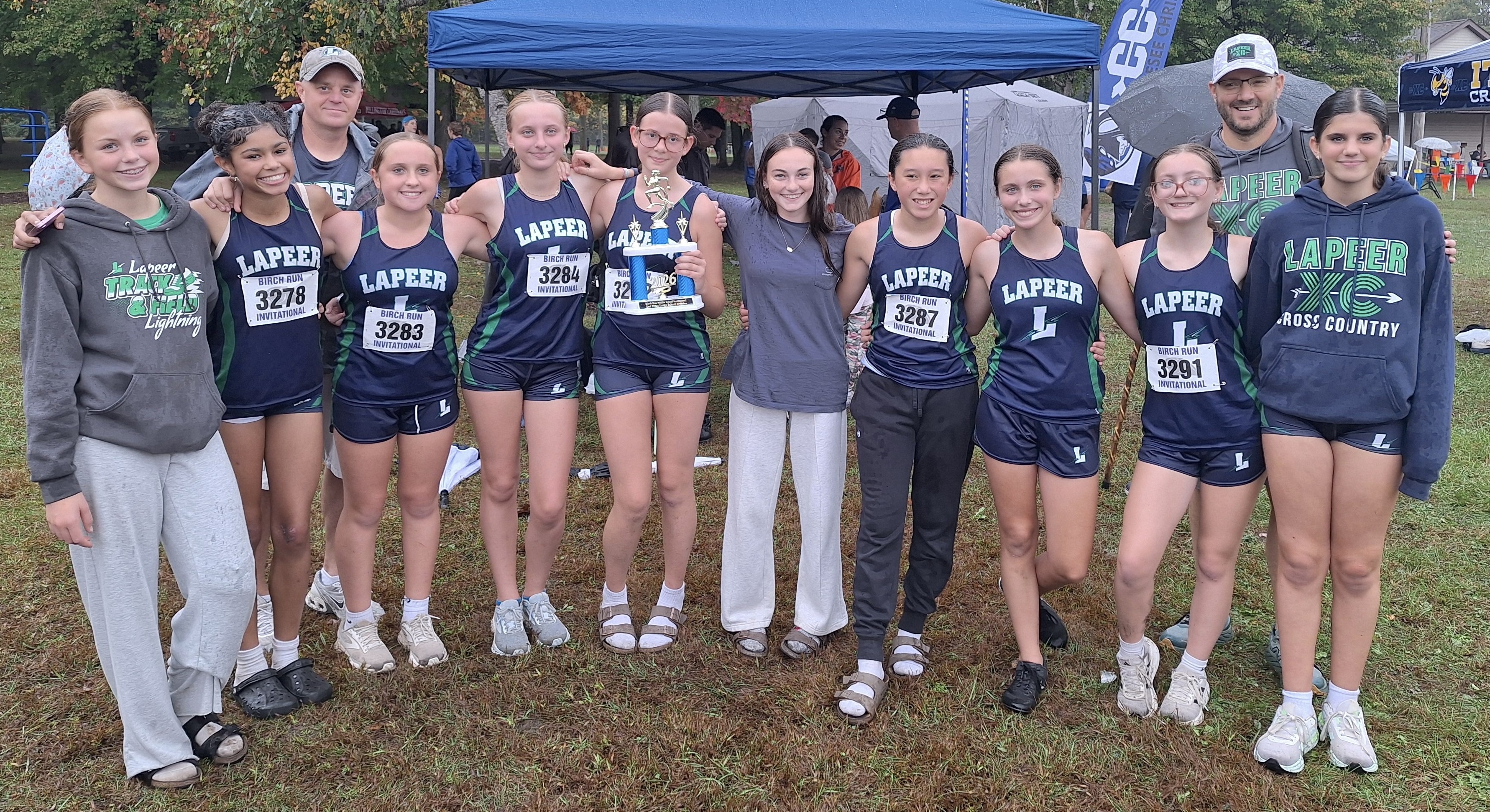 Lapeer middle school cross country teams celebrate wins and championships at the Birch Run Invitational on October 1, 2026.