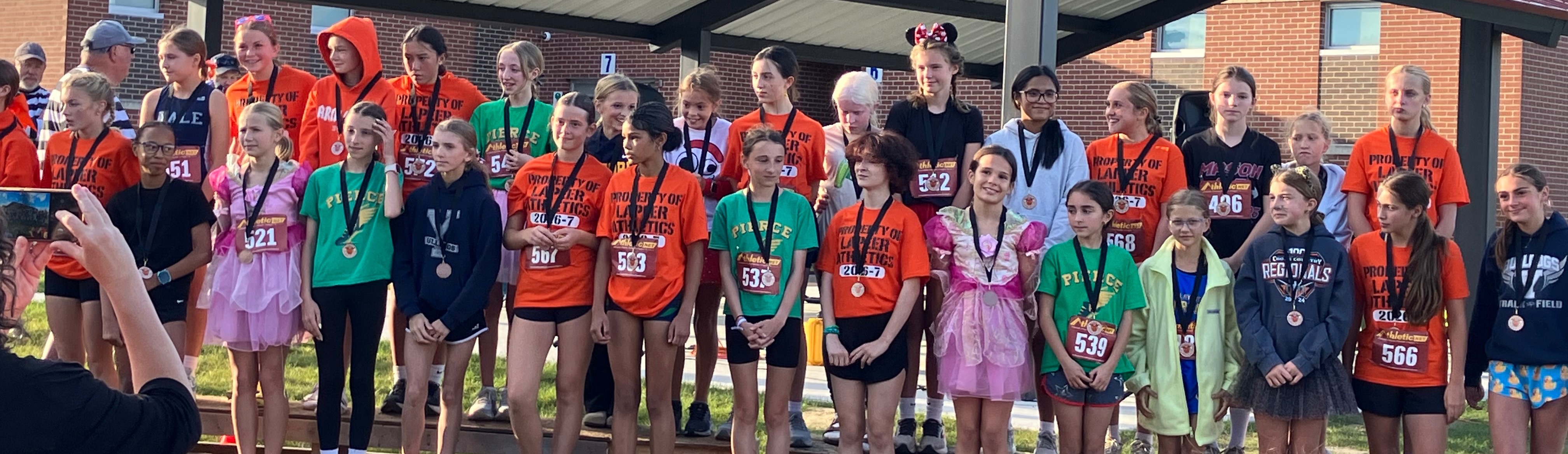 Girls cross country champions of the October 8 middle school meet at Rolland-Warner