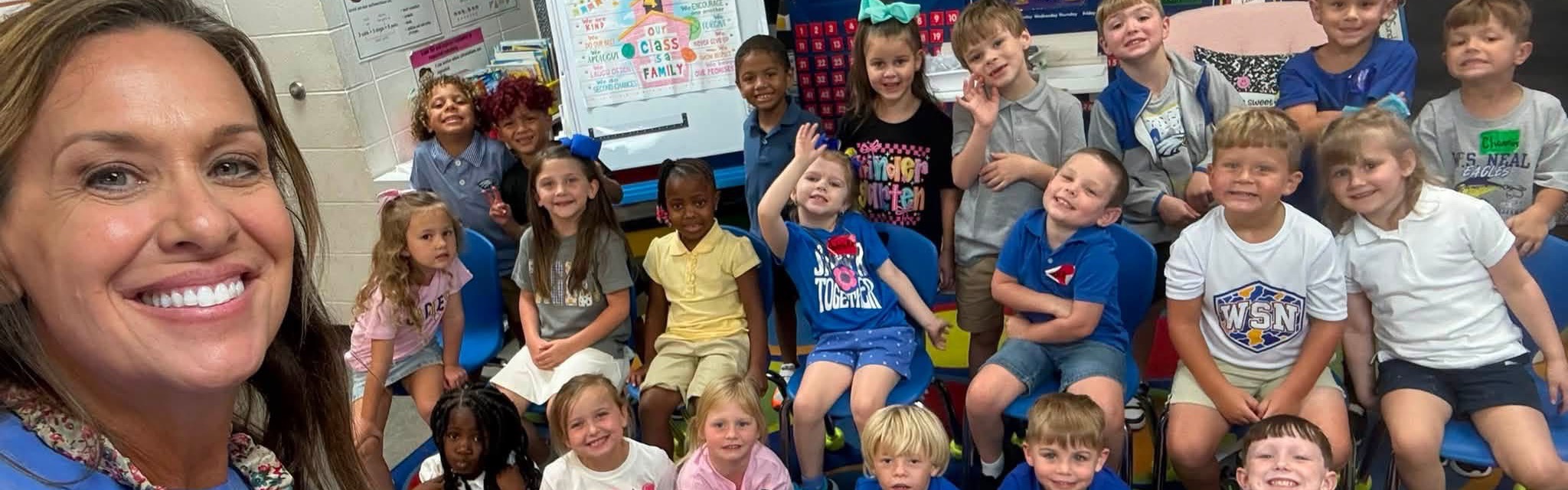 Students with teacher on first day of school