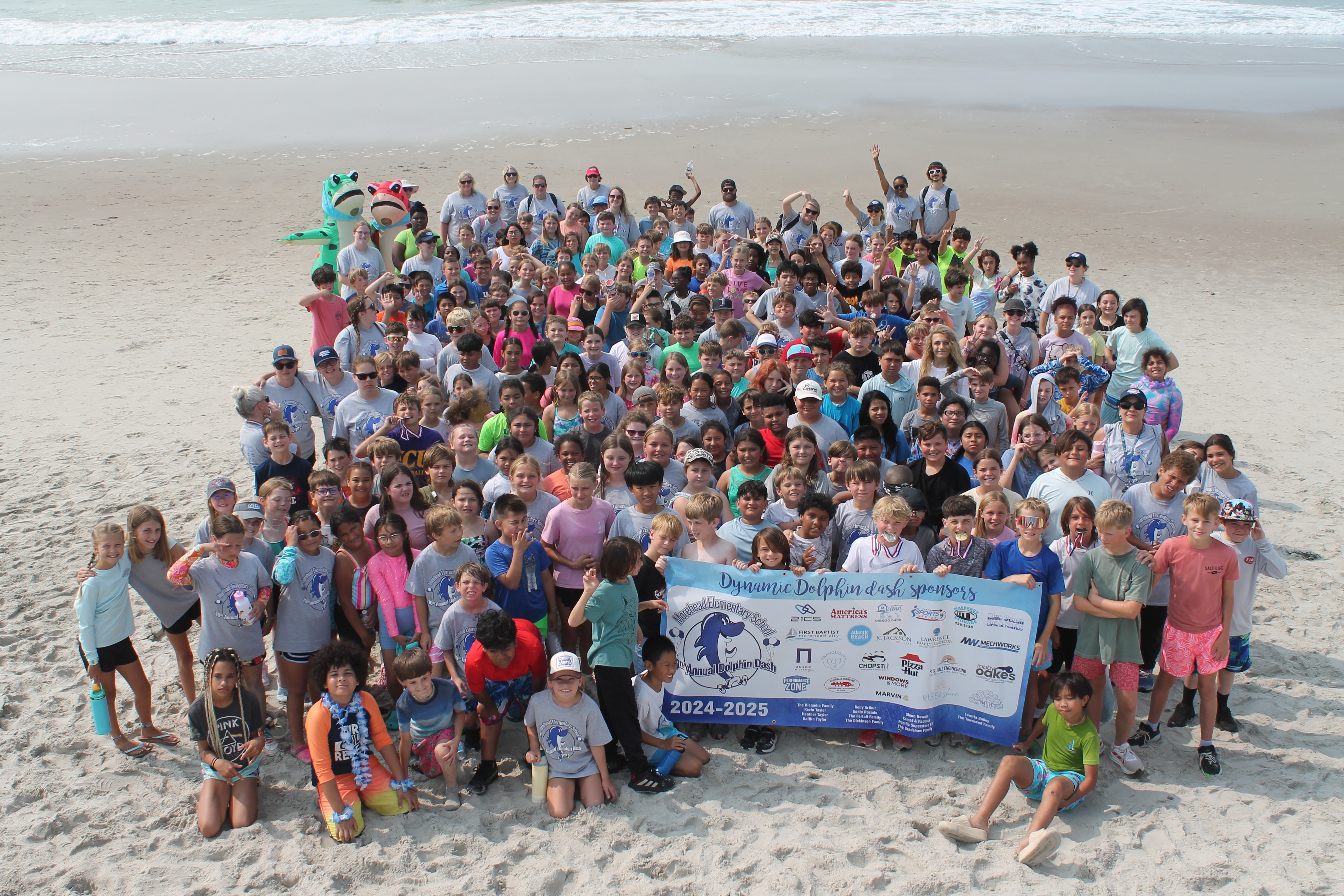 A photo of students on thie beach