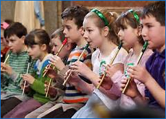 A photo of students playing instruments