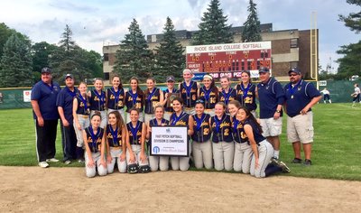 A photo of the softball team with an award