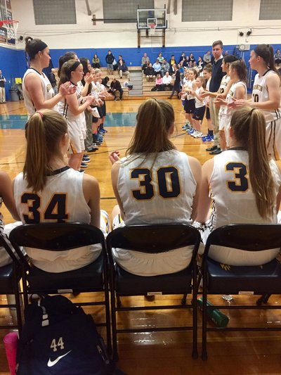 A photo of the girls basketball team at a game