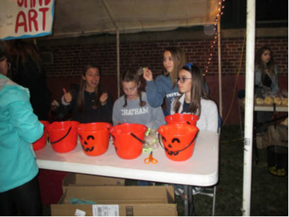 A photo of students at an Interact Club halloween event