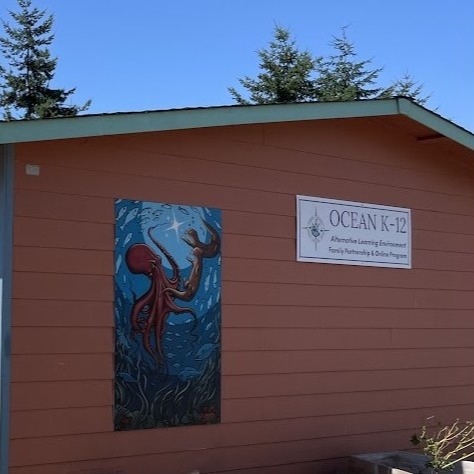 OCEAN building with jessie watsons artwork of an octopus and the ocean k-12 sign 