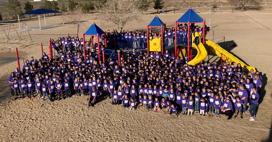 students in purple t-shirt
