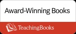 Book guides and lesson plans arranged on a table, showcasing educational resources for teachers and students.