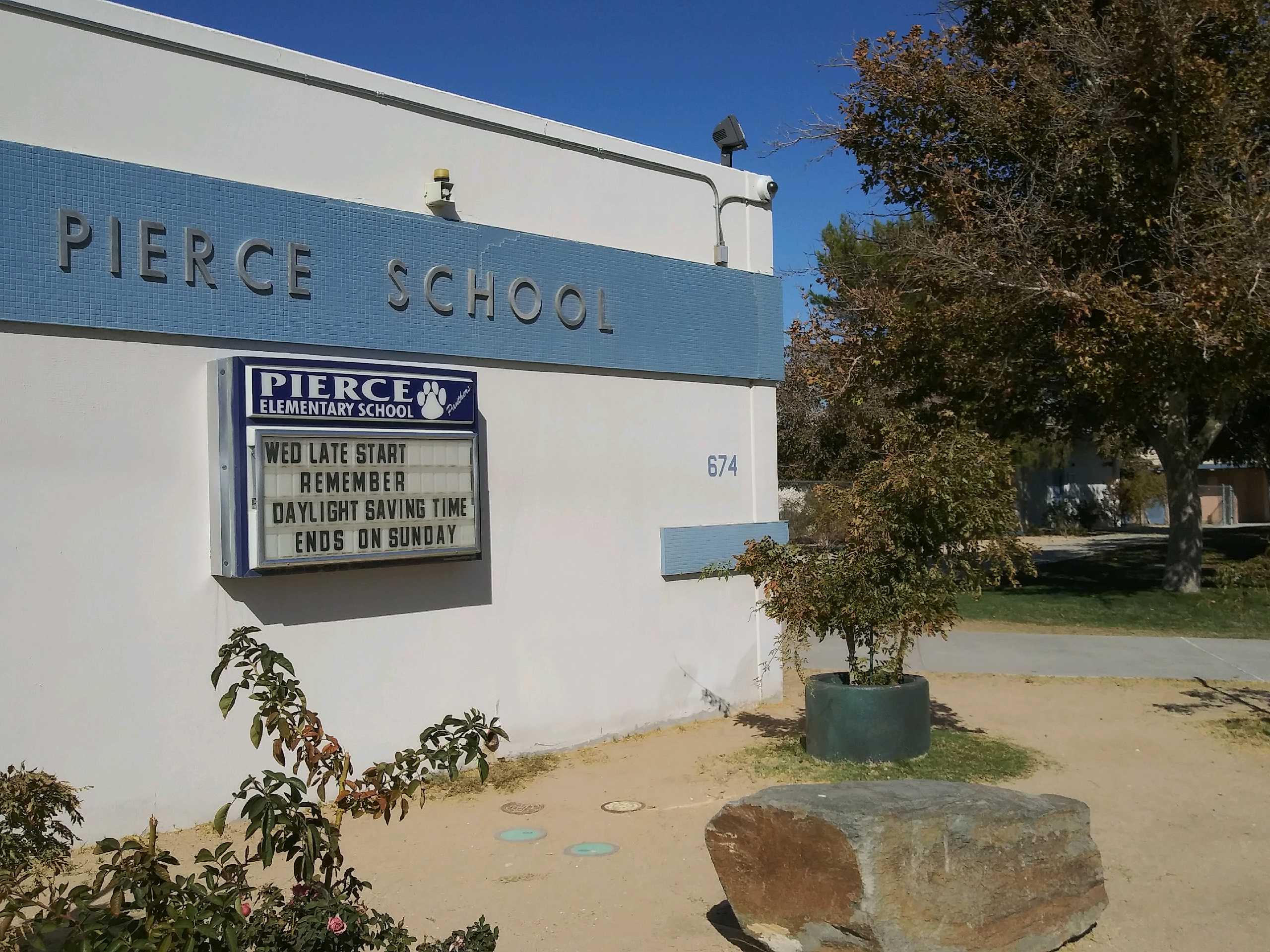 Pierced school building in California, showcasing modern architecture with large windows and a unique design.