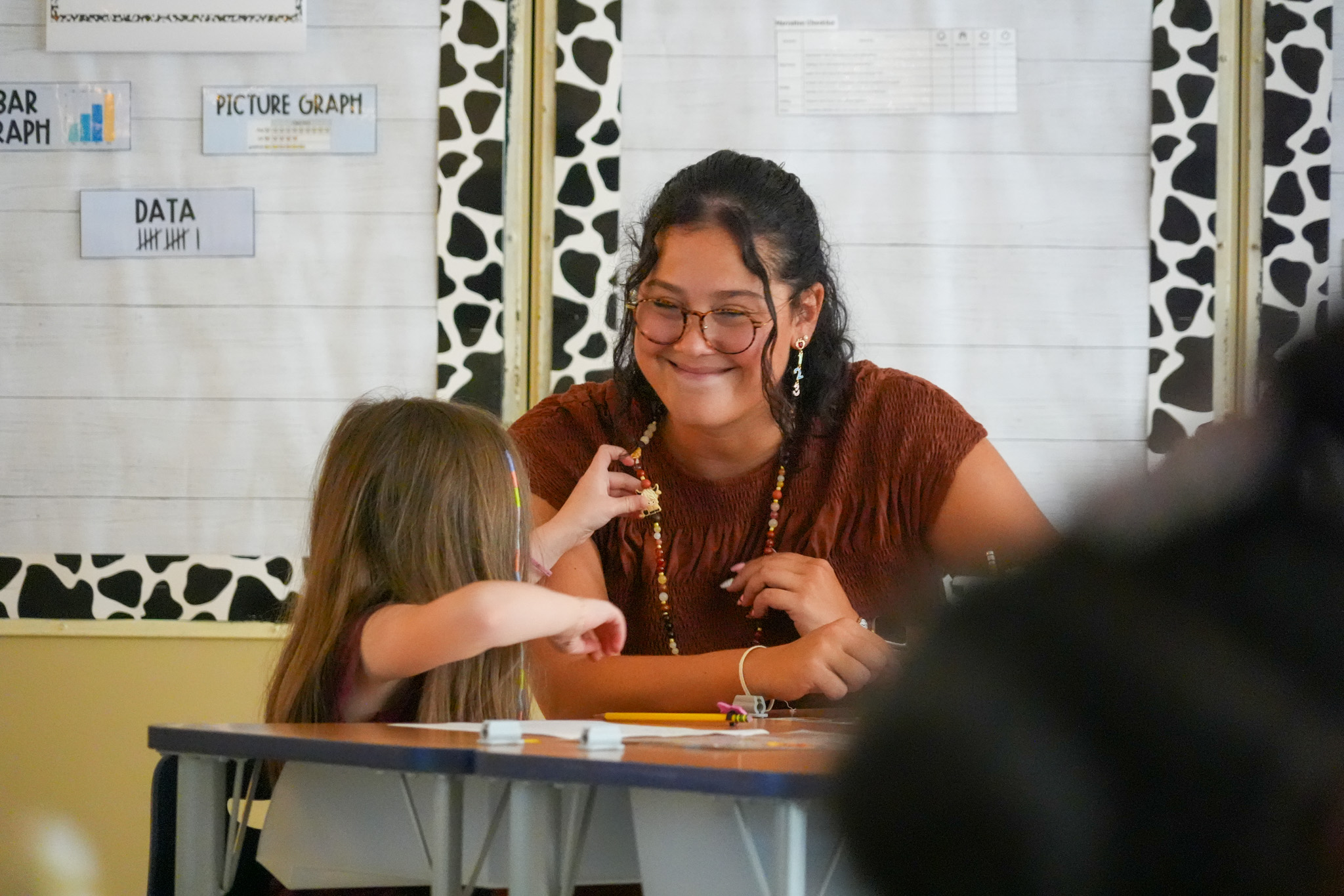 teacher and student working