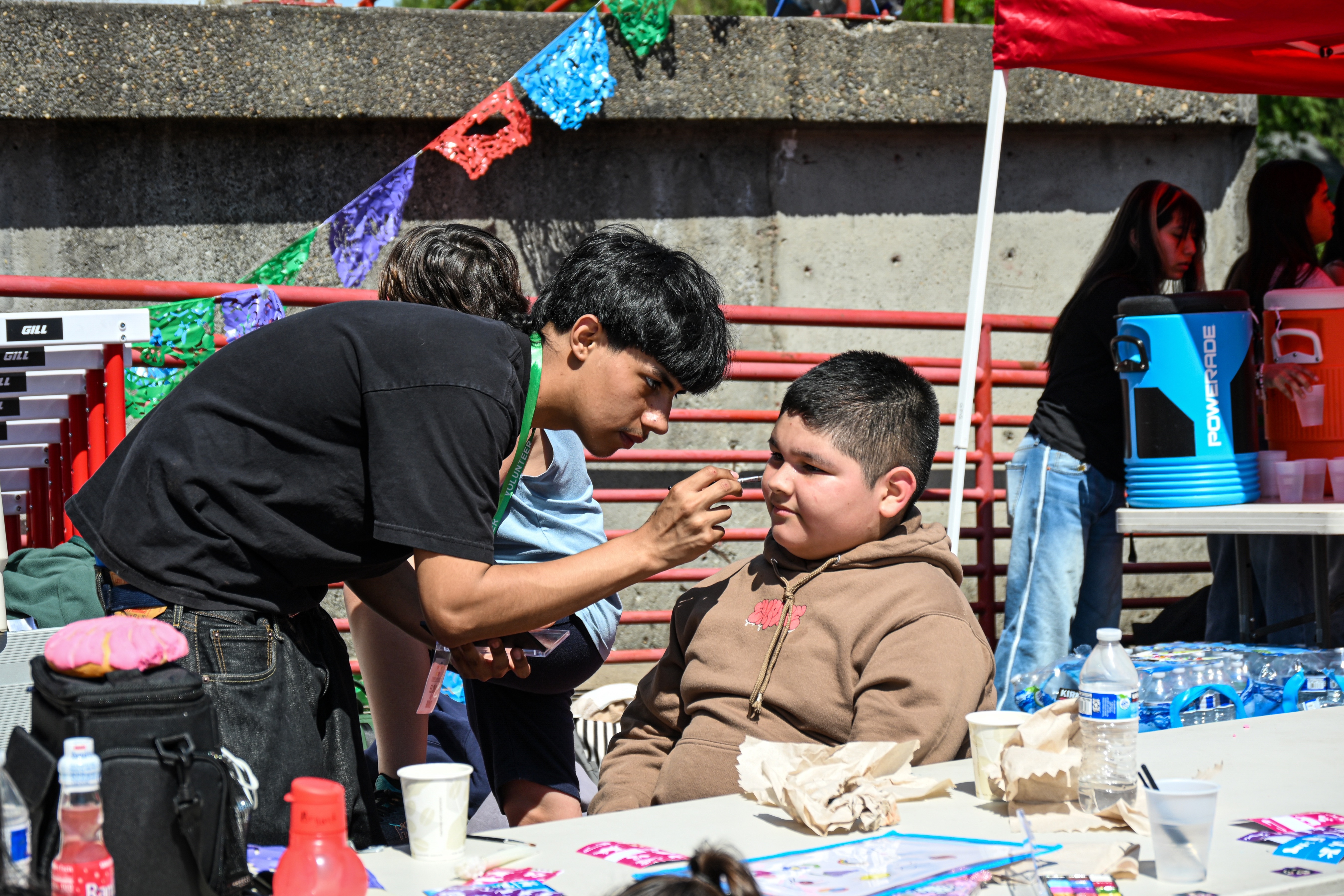 Kid painting faces