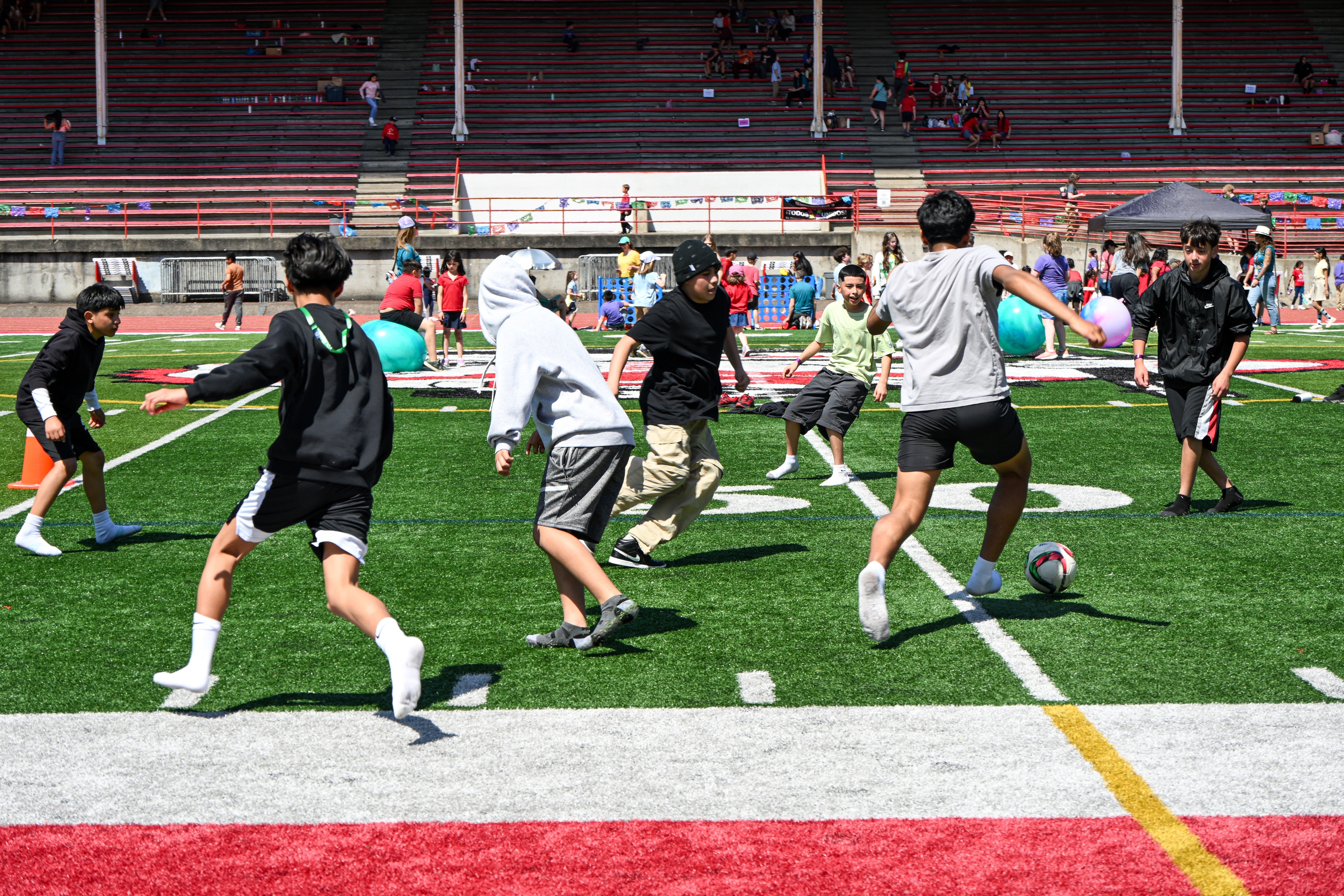 Students playing soccer