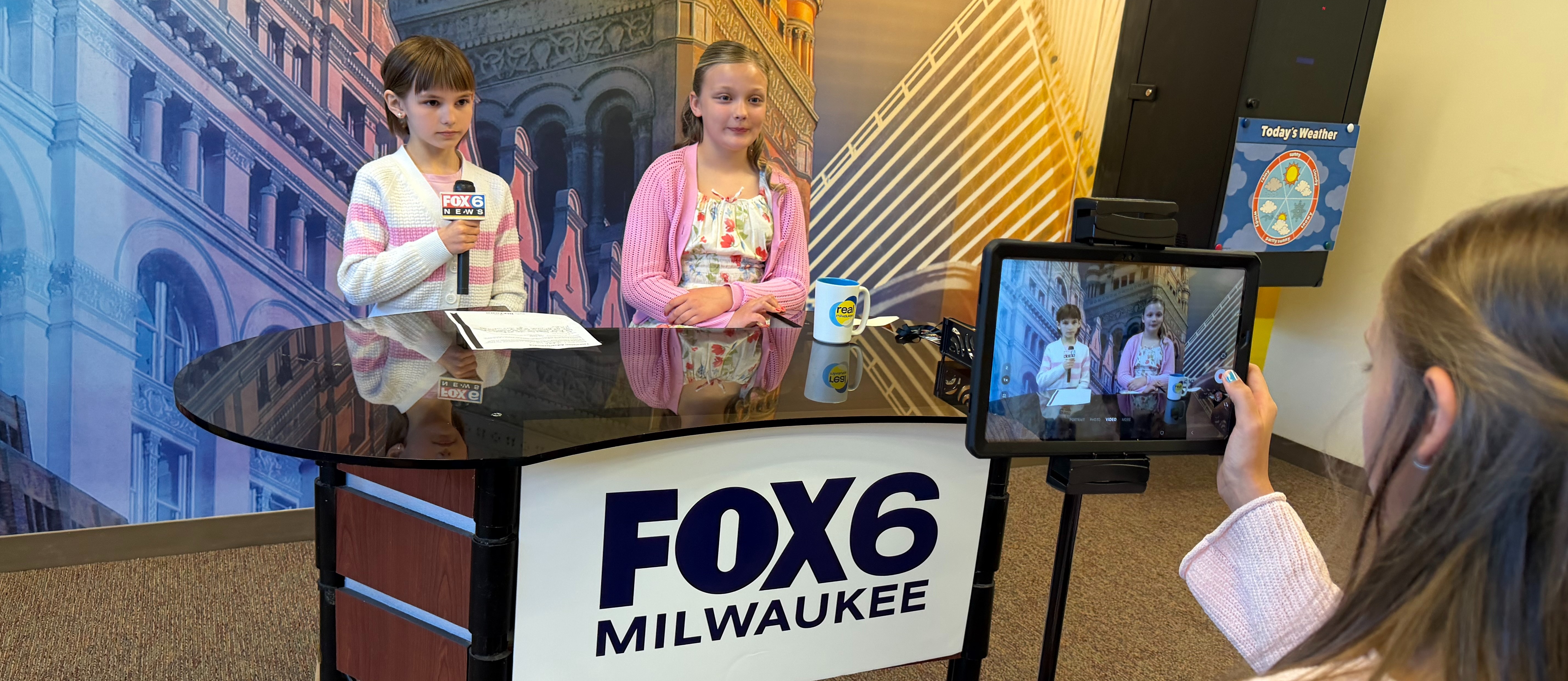 Kids at news desk that reads fox 6