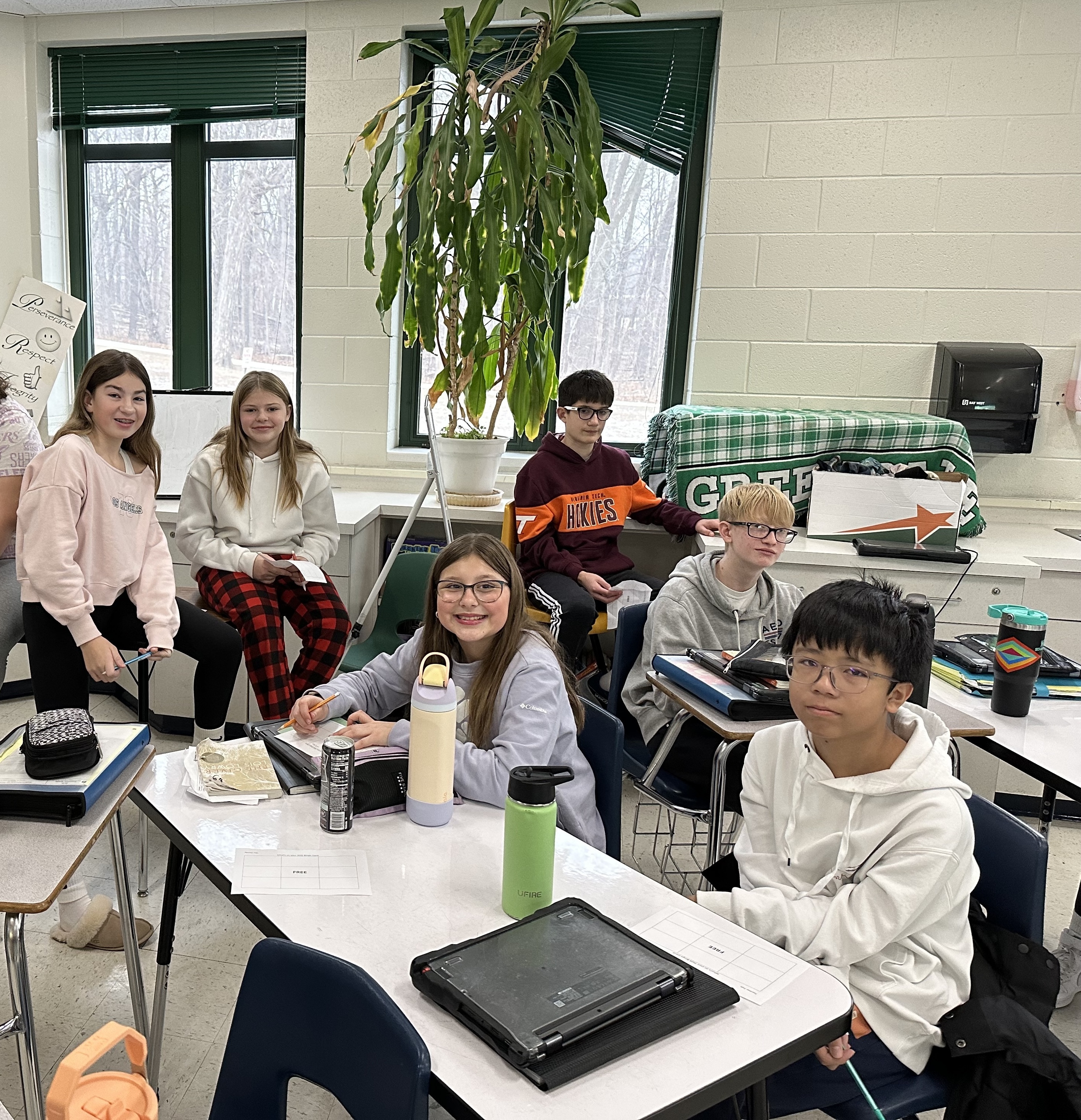 Students in classroom working on chromebooks.