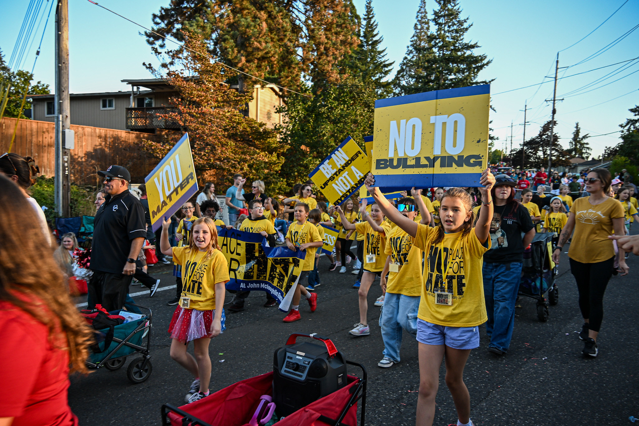 Kids walking in the homecoming parade