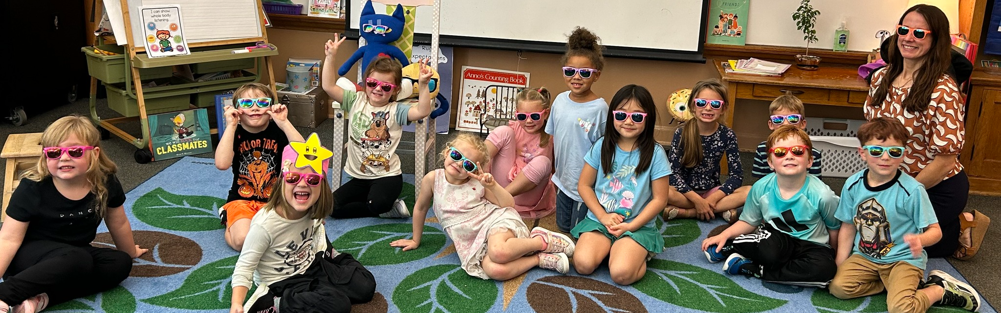 Students in classroom with sunglasses on