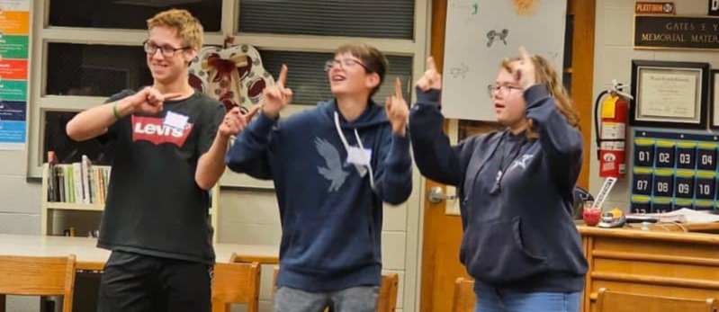 Students dance during class activity