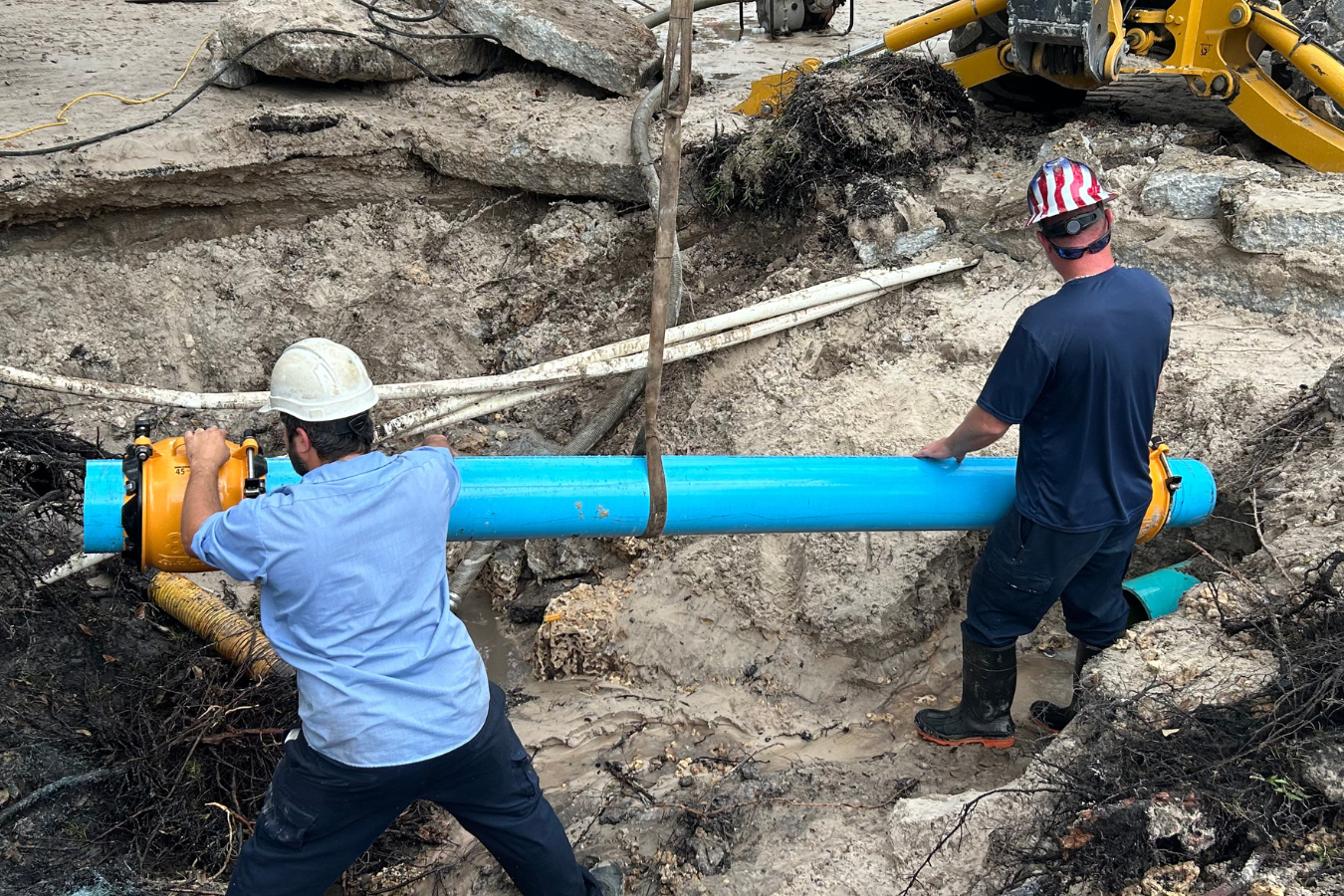 Cooper City Utilities workers fixing a water pipe
