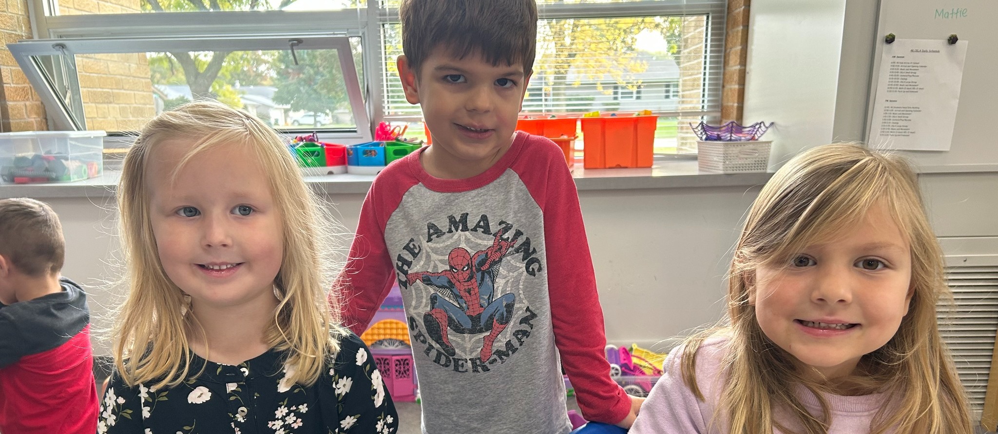 Students playing with Playdoh in their classroom