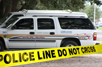 Police Live Do Not Cross Banner in front of Westwego Police SUV vehicle