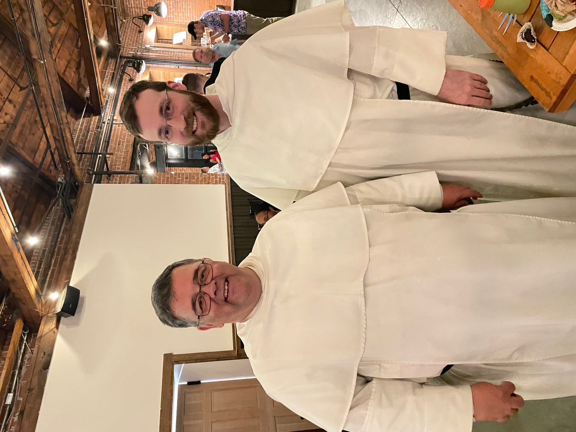 Fr. James and Fr. Irenaeus supporting SPV