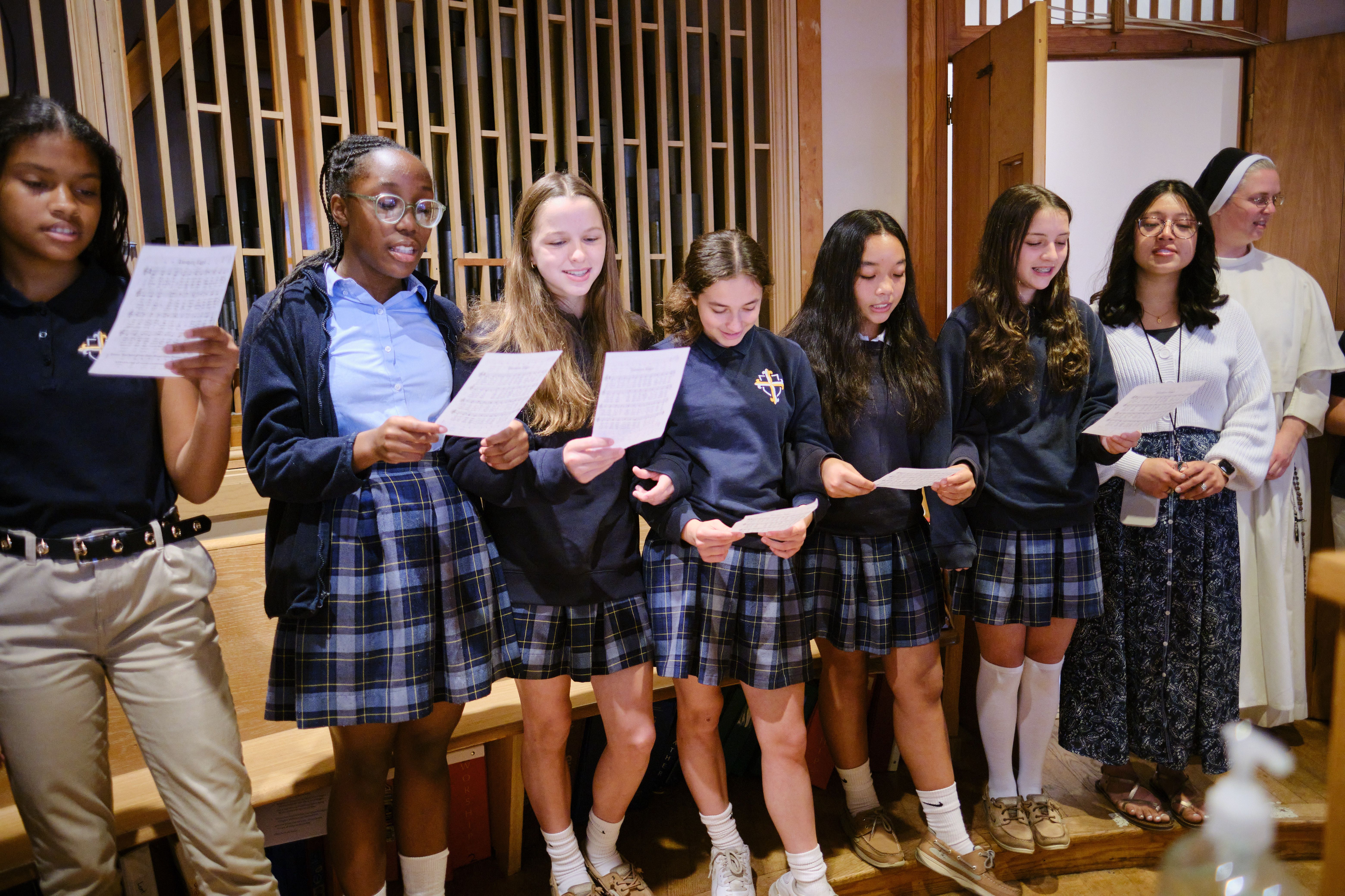 Students at St. Pius V Catholic School sing in the choir