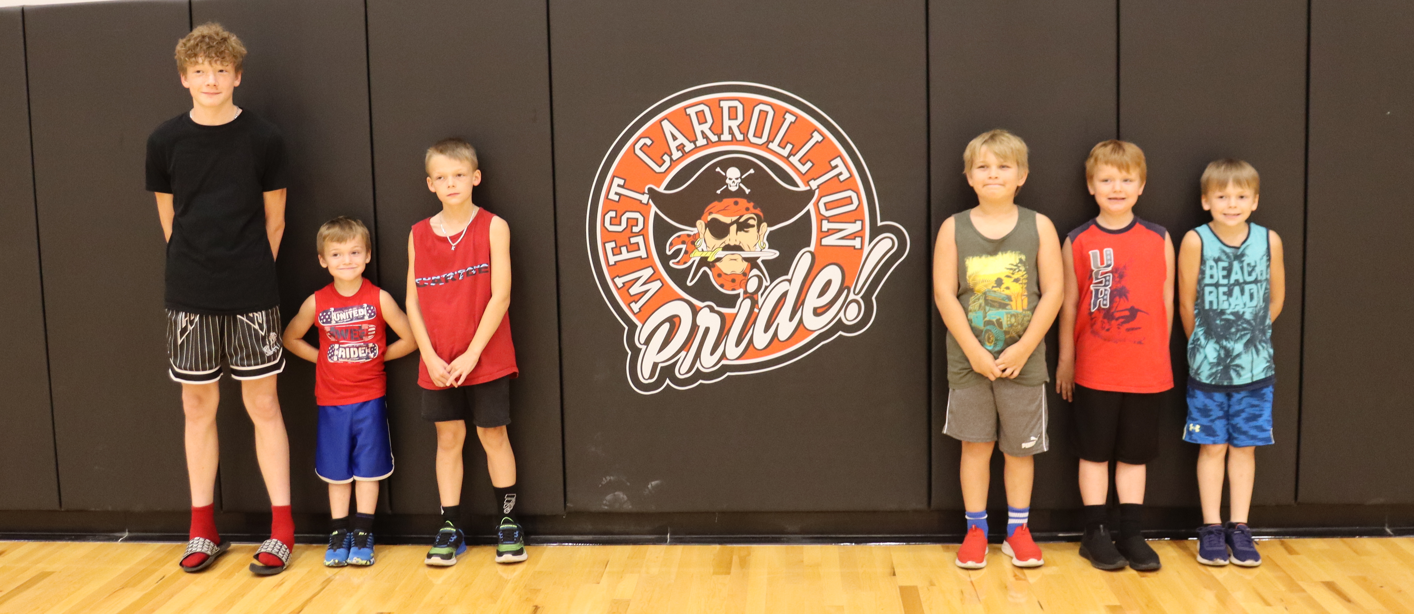 Boys with Pirate Pride Sign