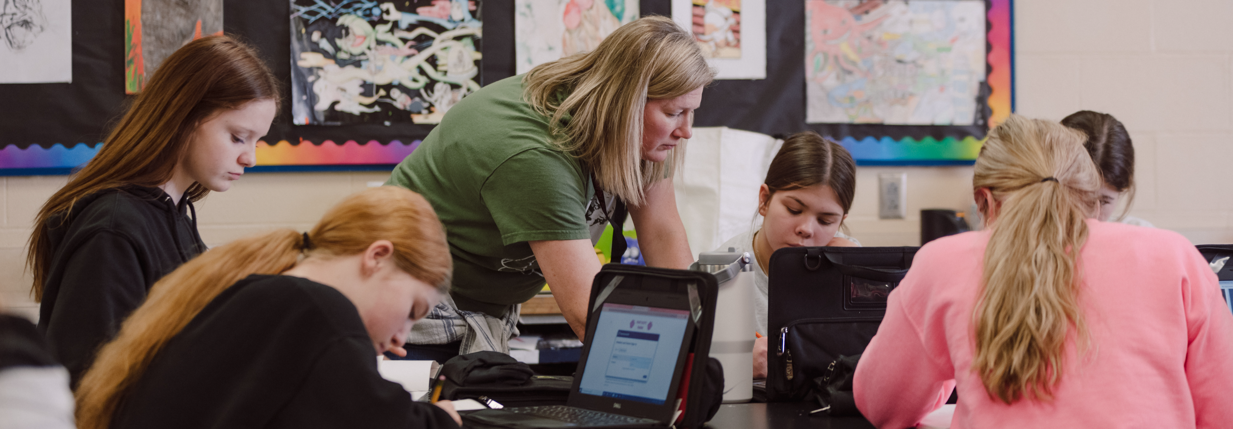 Teacher interacting with students