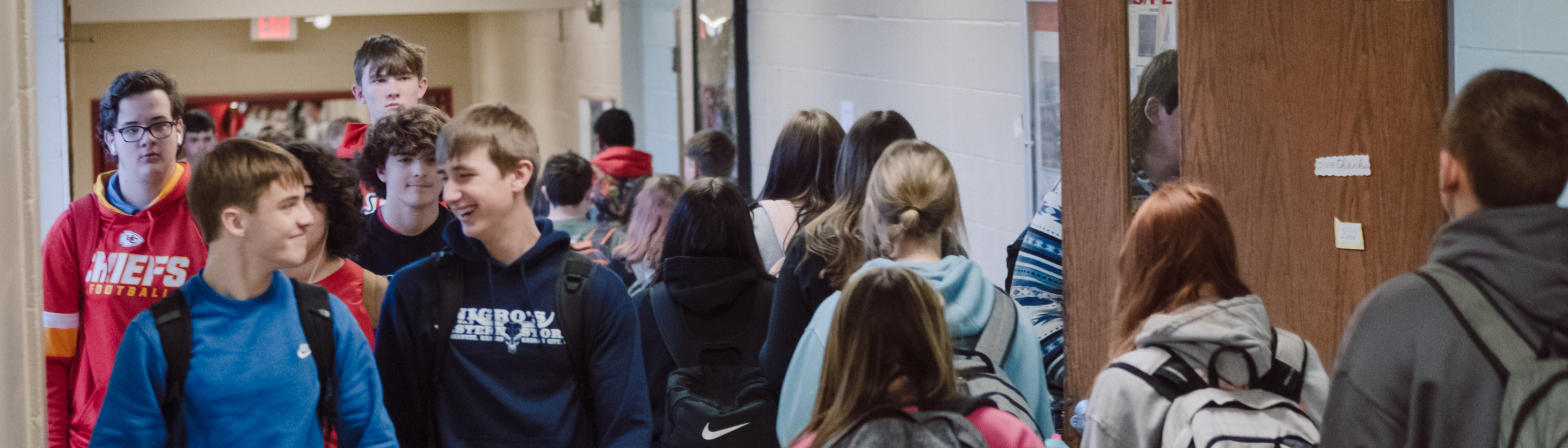 High School Students Walking in Hallway