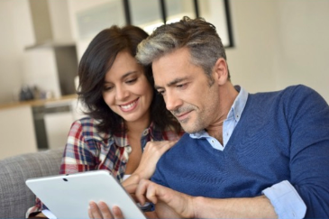 Parents looking at an iPad together