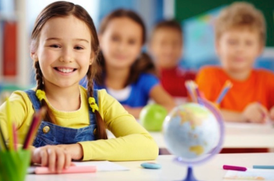 A group of happy students in the classroom