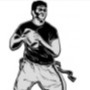 Flag football player holding a football in black and white