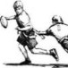Black and White flag football player carrying a football with a player diving for a flag