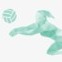 Green volleyball player diving for a volleyball with a white background