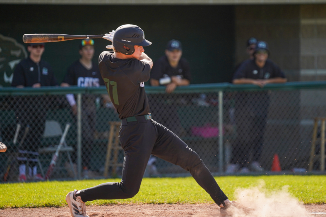 Baseball player swinging bat