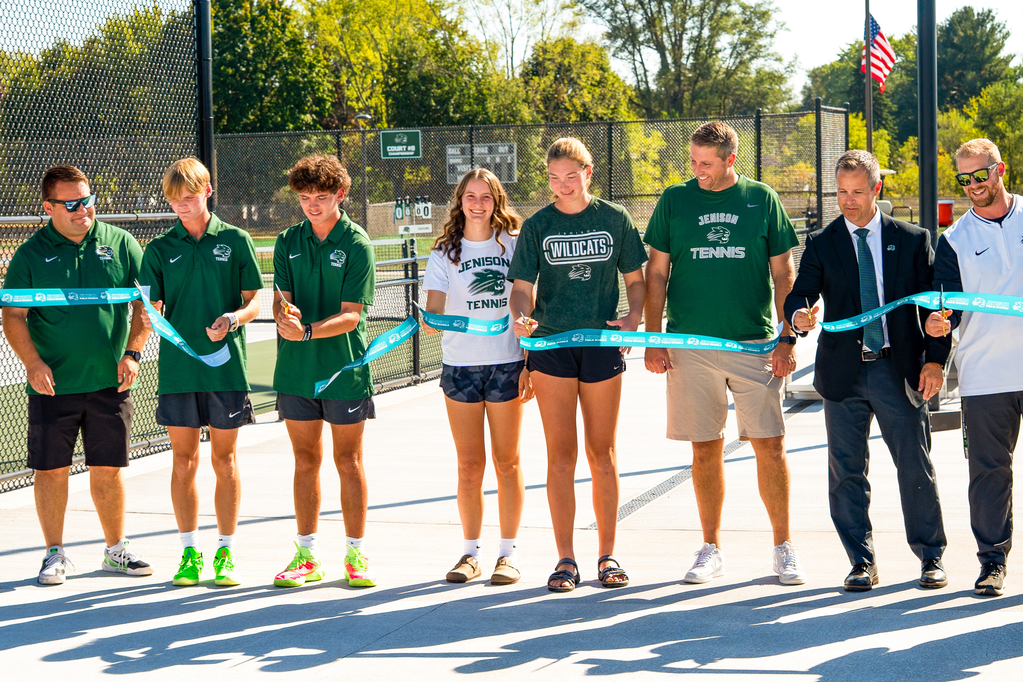 Students cutting ribbon