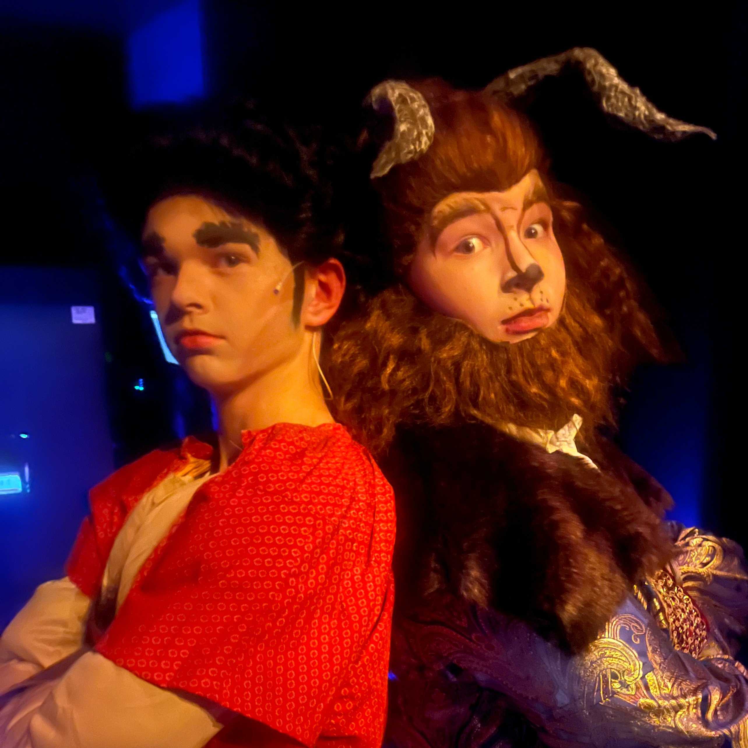Two students dressed as Gaston and the beast posting back to back from the Junior High Musical, Beauty and the Beast