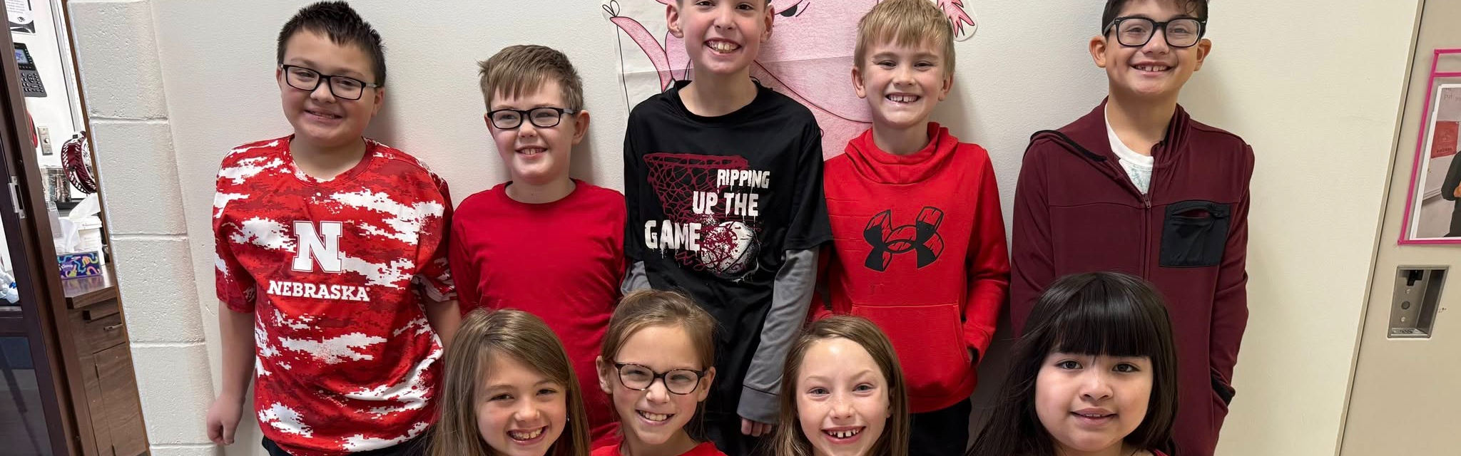 Group of students dressed in red