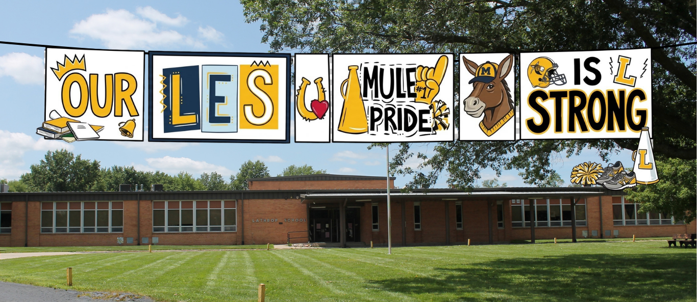 Elementary building in the background, banner in front that says: Our LES mule pride is STRONG