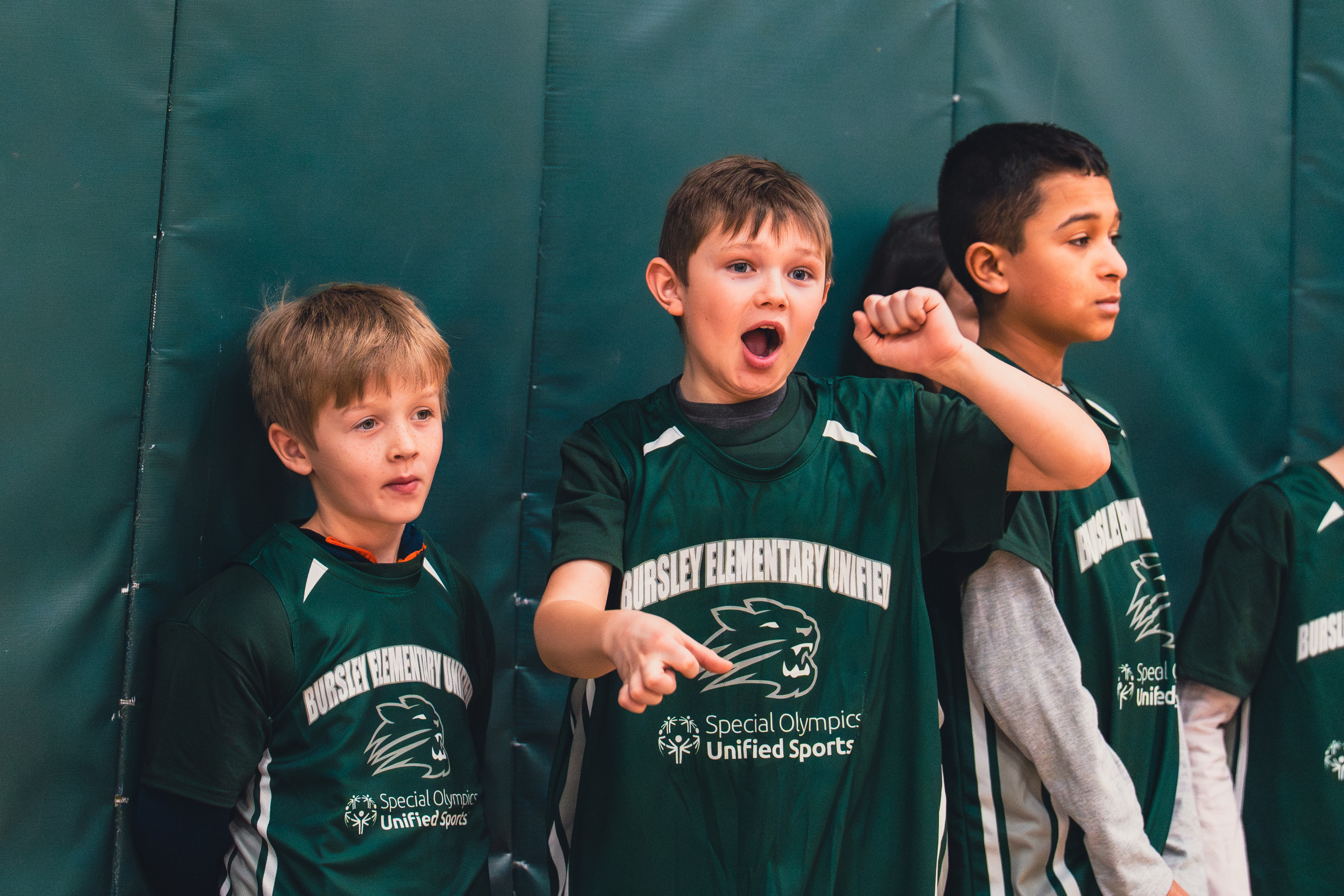 Student cheering at basketball game