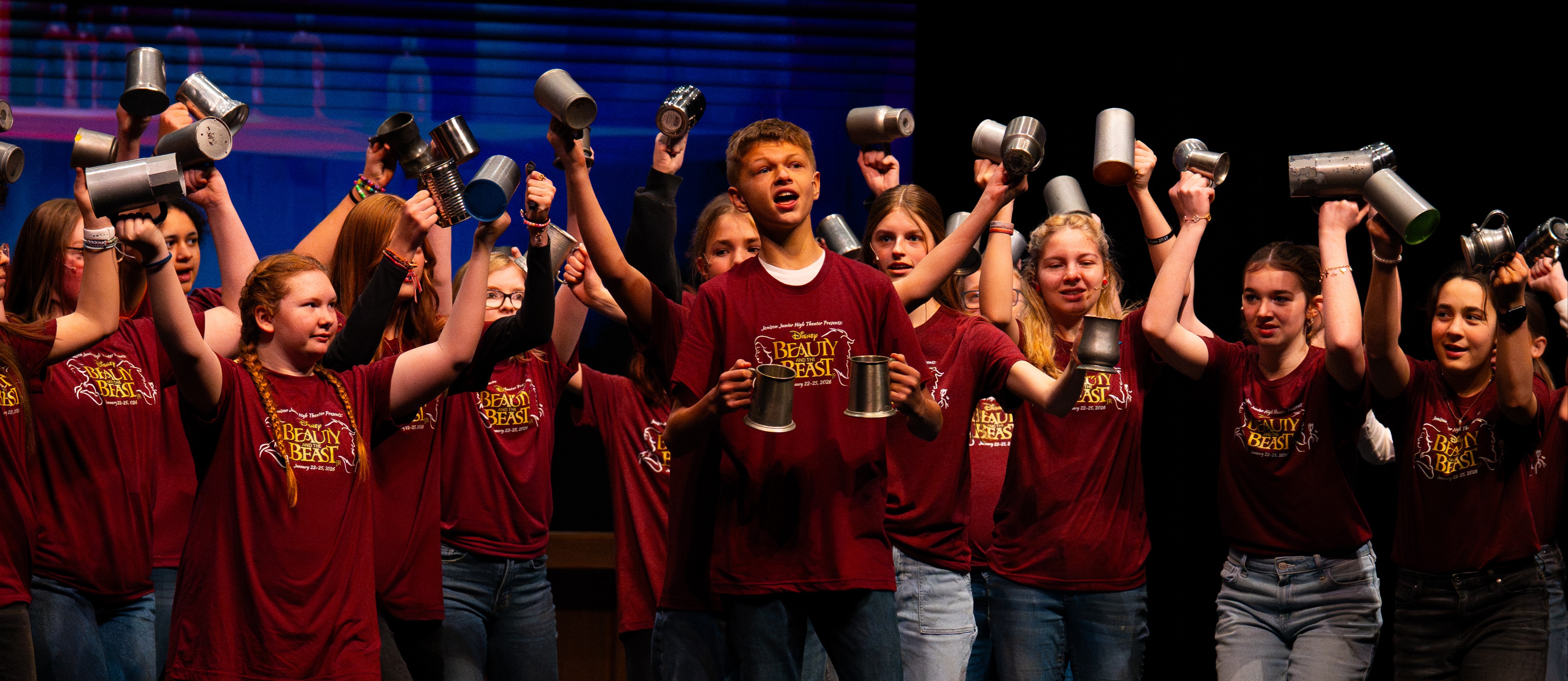 Student actors singing in play